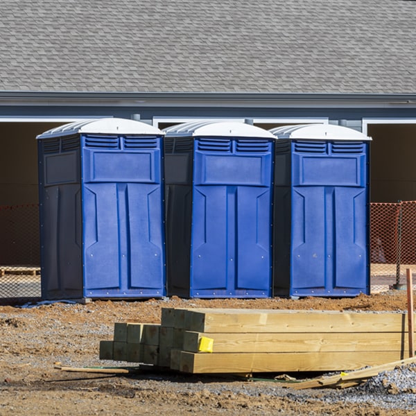 what is the cost difference between standard and deluxe portable toilet rentals in Wood Ridge